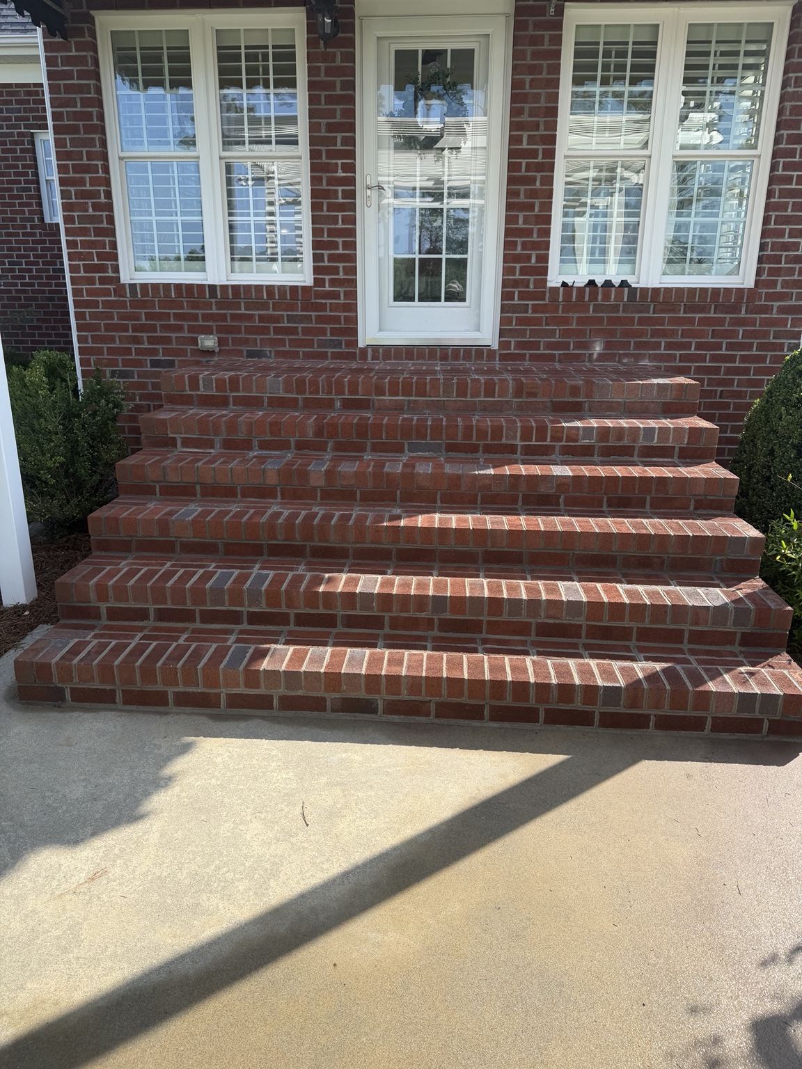 Completed brick steps and porch landing